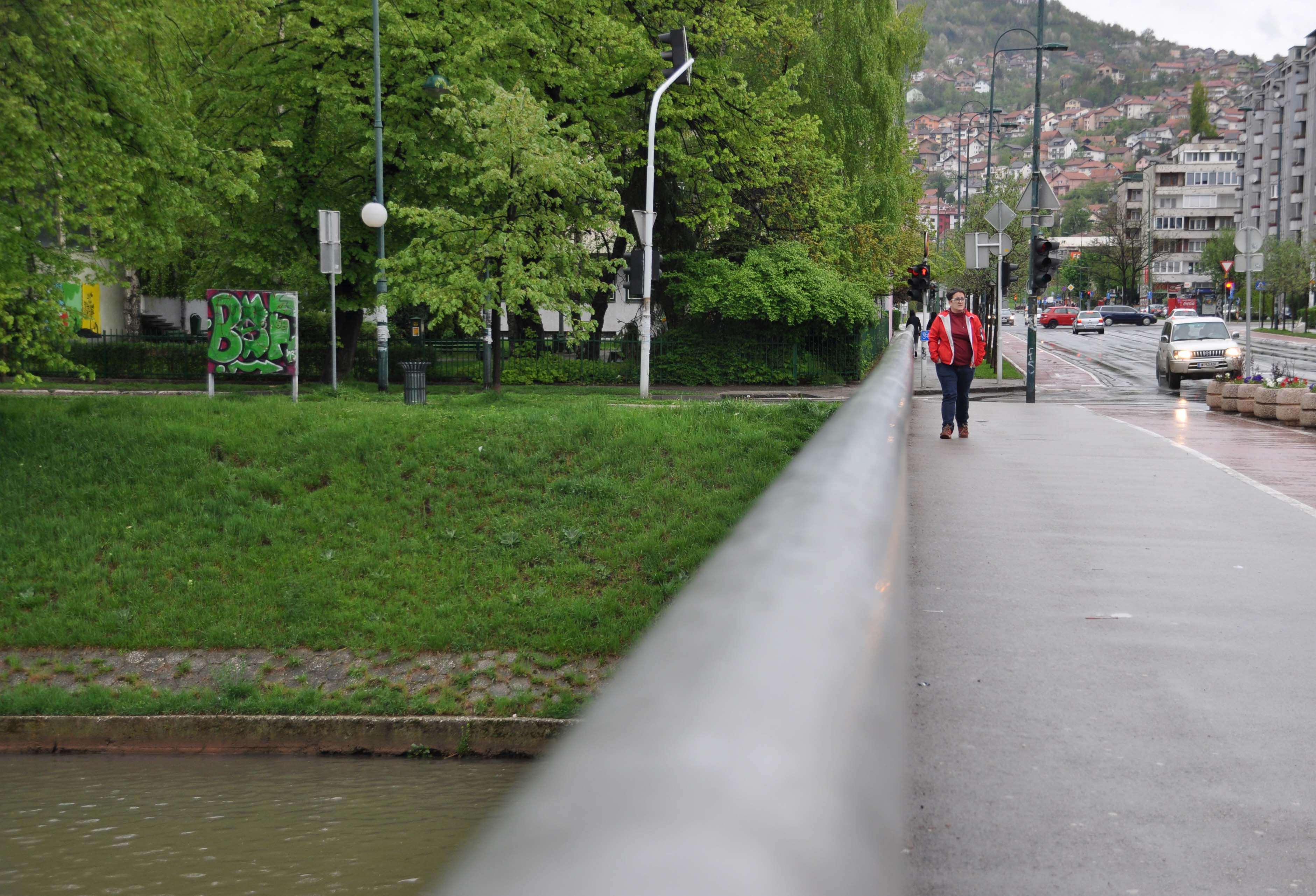 Lejla Kalamujić on the bridge she crossed during the war in Sarajevo